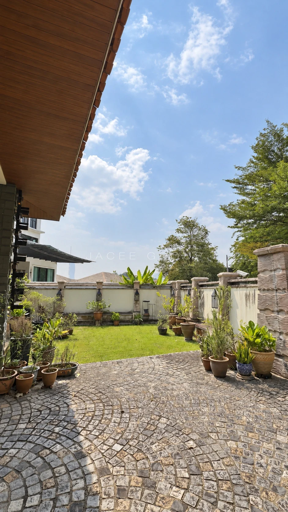 Driveway and Garden at hilltop bungalow in Damansara Heights