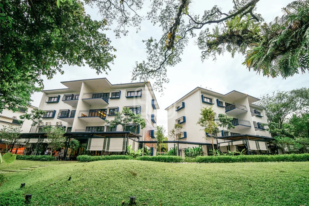 Tree-lined grounds and retail frontage at The Stories of Taman Tunku, Bukit Tunku